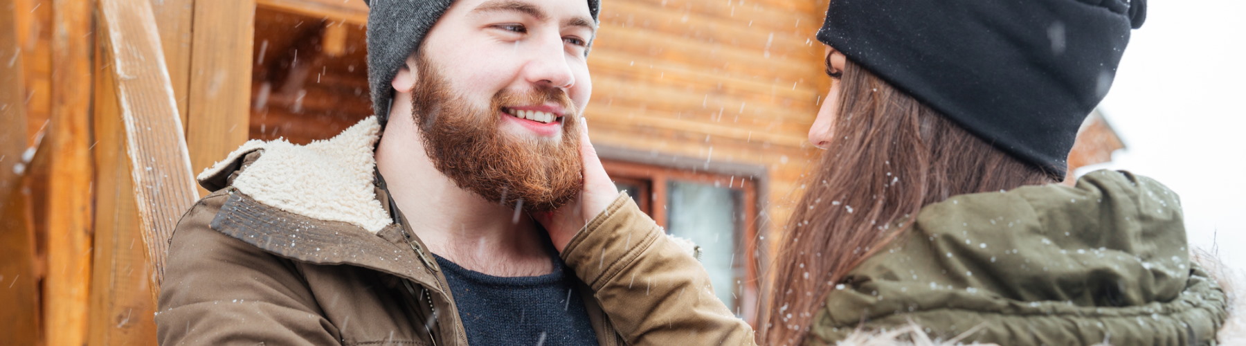 Couple in a cold weather cabin